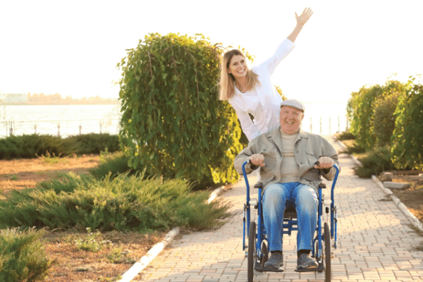 Support Worker with man in wheelchair